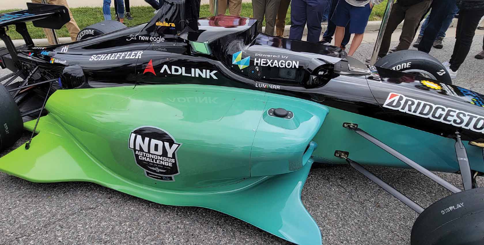 Close up view of green Hexagon branded Indy car